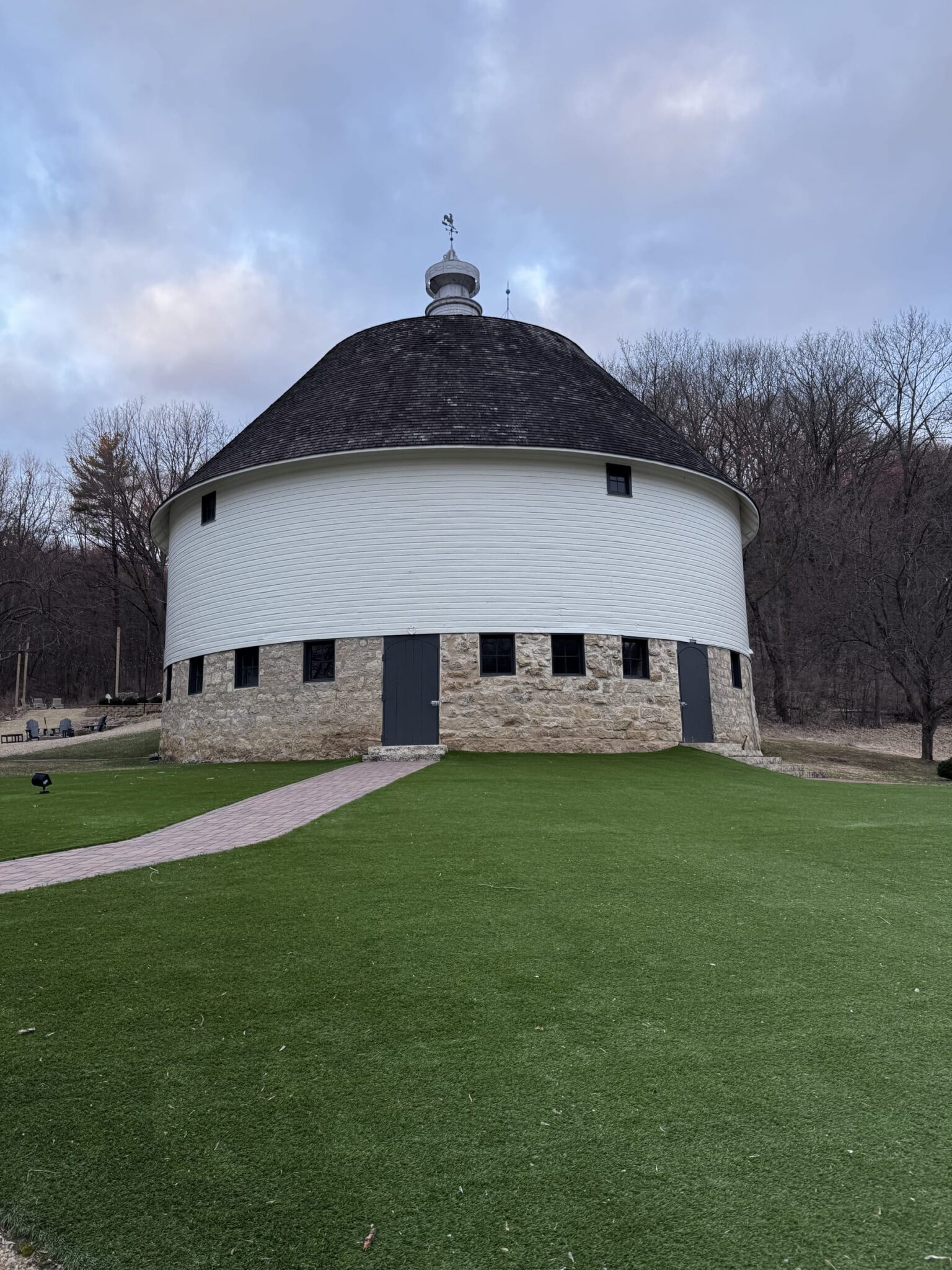 Ground-level view of the completed round barn with new roof, Wacouta MN